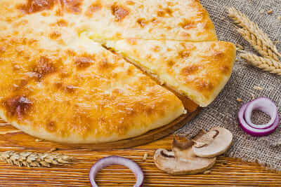С картофелем, грибами и луком (къозоджын)
